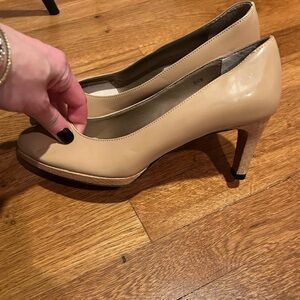 Nude pumps with snake skin detail